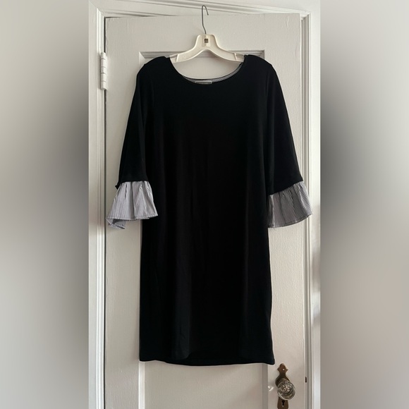 Black jersey dress w long sleeves and striped cotton blousing at wrist. - Picture 1 of 2